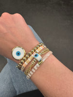 Load image into Gallery viewer, Evil eye gold bracelet
